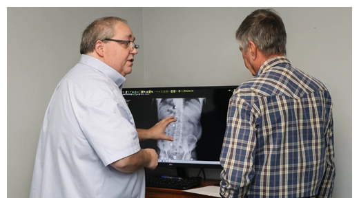Chiropractor Mannford OK Scott Renshaw X Rays With Patient