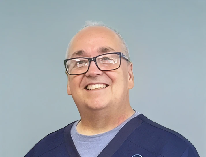 Dr. Scott Renshaw smiling for potential patients